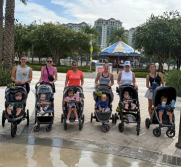 Families lined up with strollers